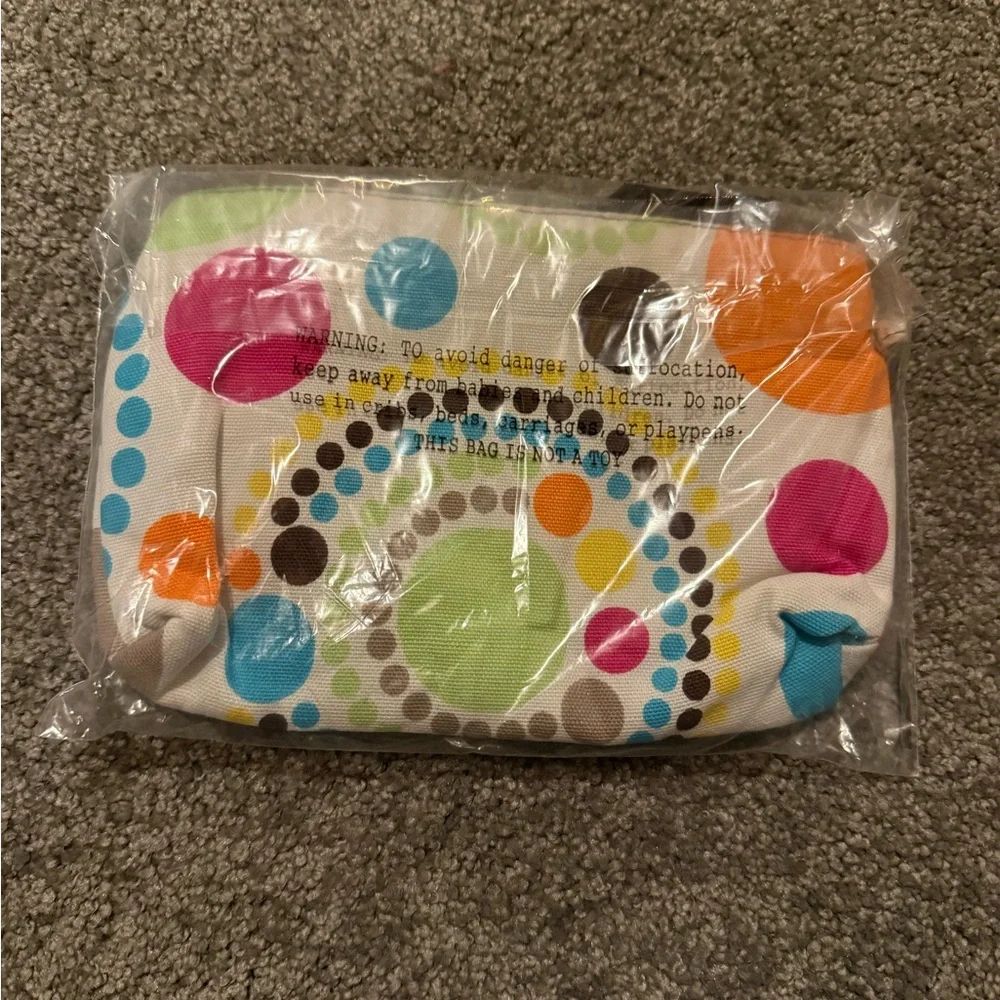 Brand new Thirty-One Mini Zipper Pouch in Circle Spirals